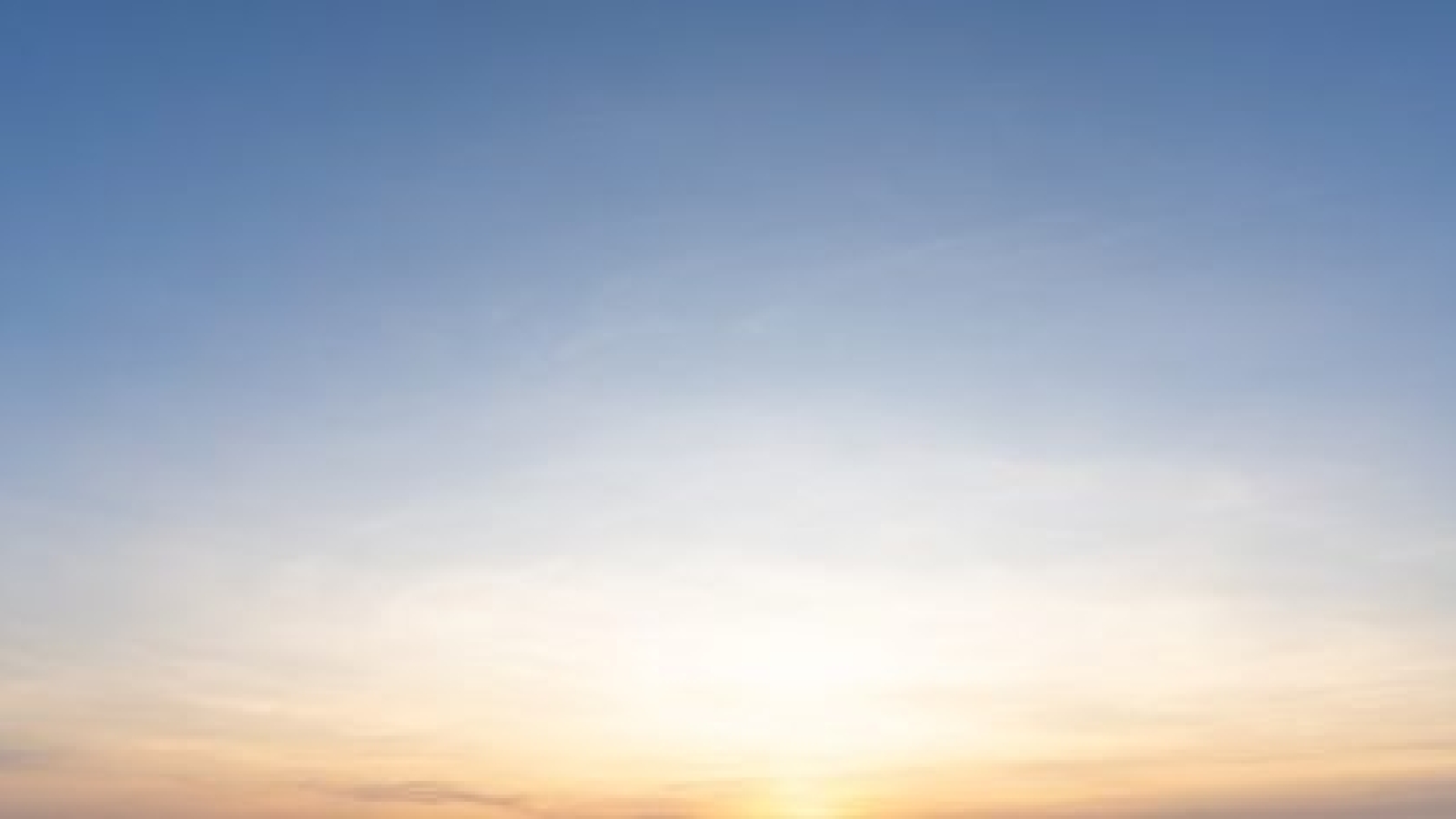 Beautiful morning or evening blue and orange sky taken at the sea is used as natural blackground texture.